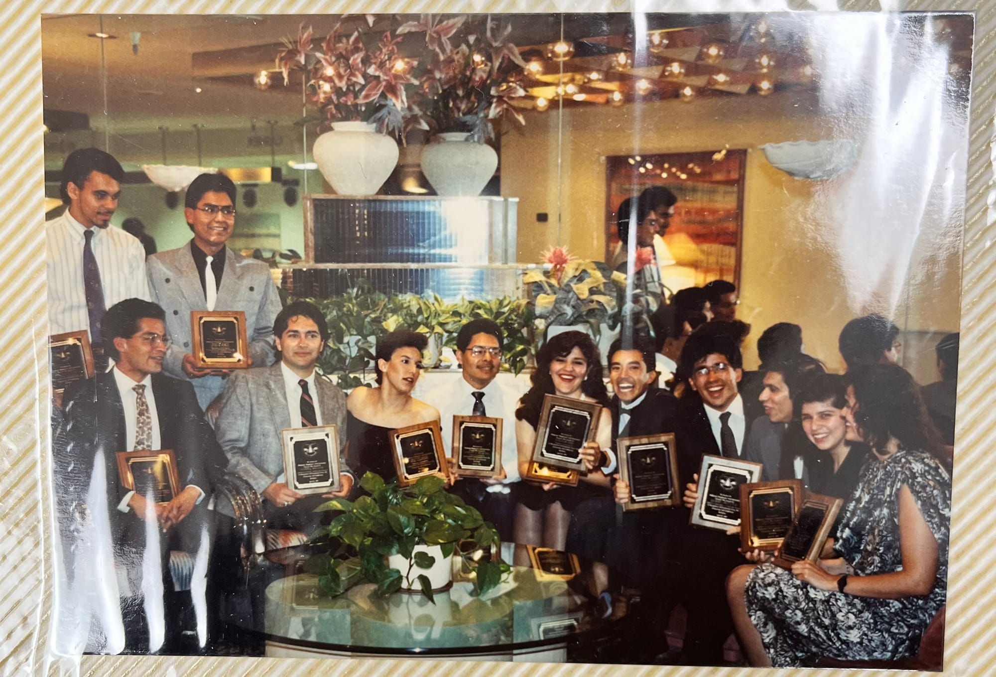 Photo of members of the Hispanic Engineers and Scientists holding awards.